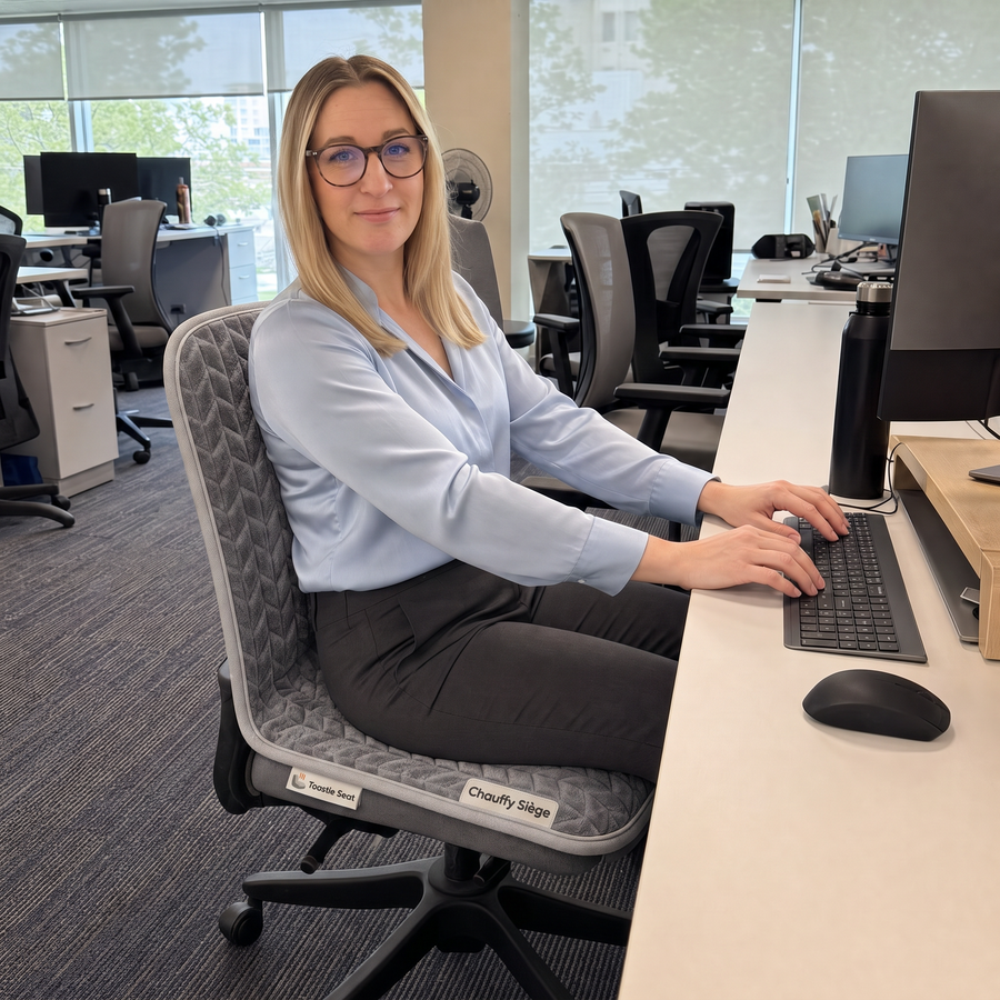 Femme au chaud à son bureau sur Chauffy Siège